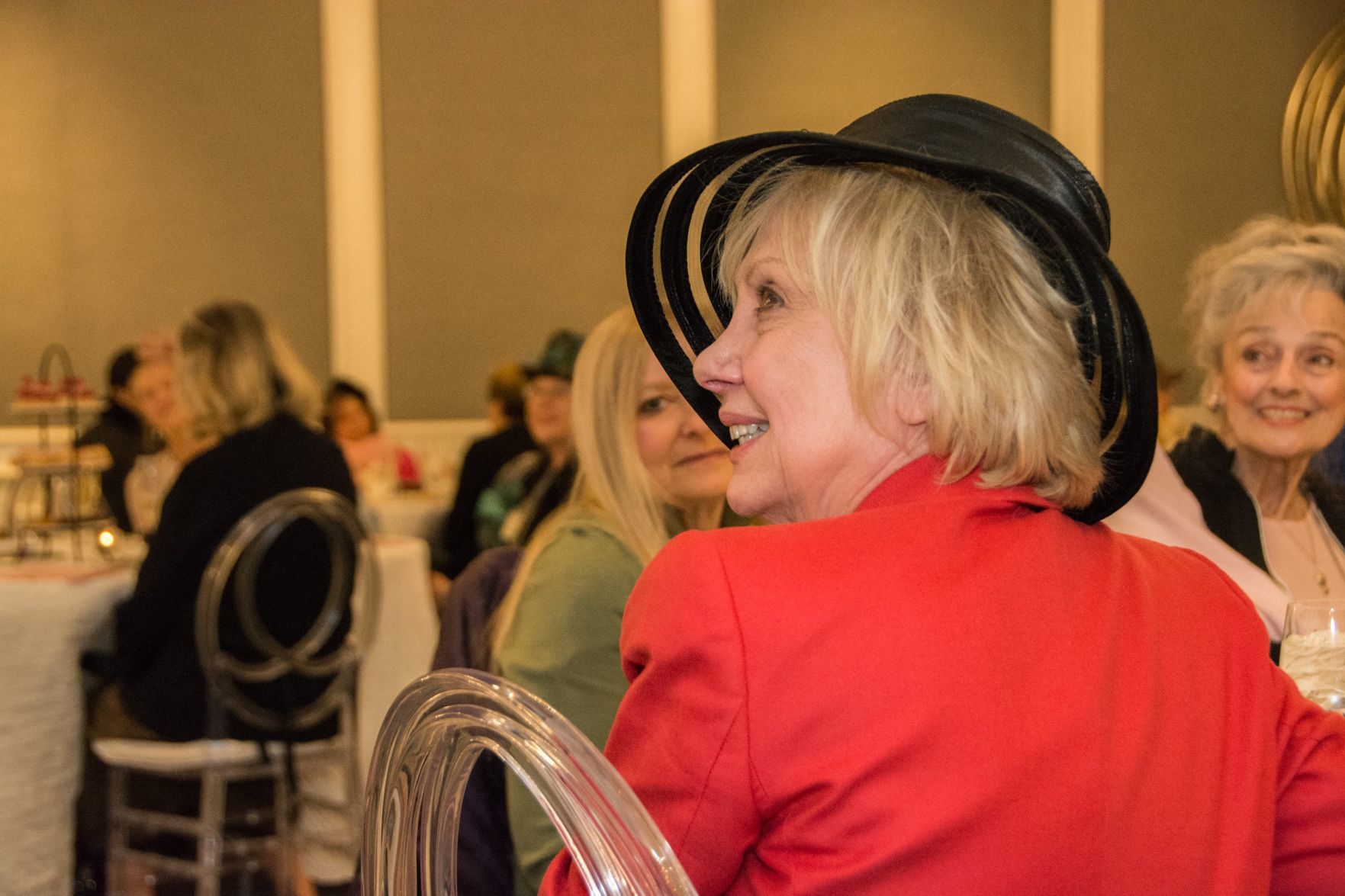 A guest watches the opera performance at Royal Tea with Winter Opera
